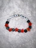 Slide away black and red stars bracelet