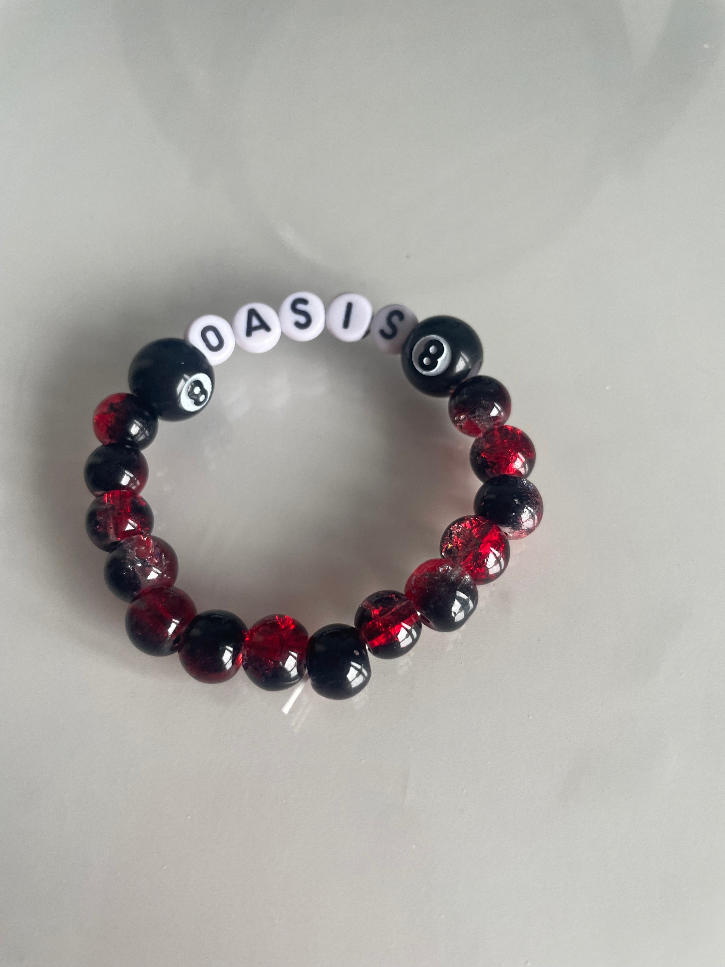 Oasis red and black 8 ball bracelet