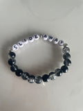 Slide away black and grey bracelet