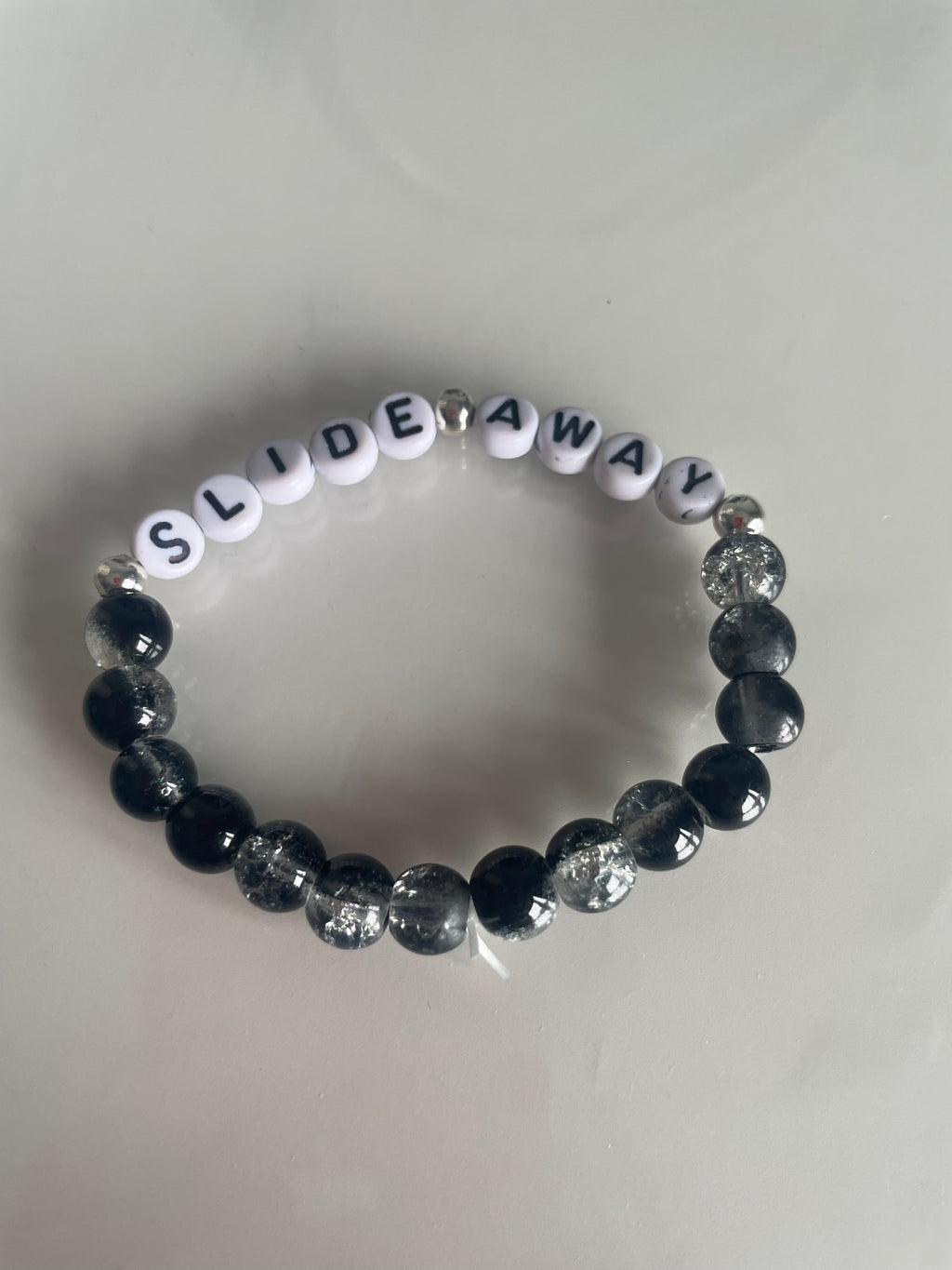 Slide away black and grey bracelet